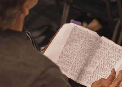 a man reading a bible