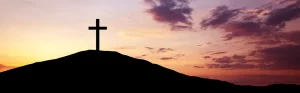 Cross on a hill representing the sacrifice of Jesus Christ